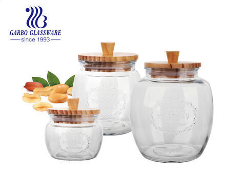 Wholesale machine-made multiple 3sizes cheap glass storage bottle round storage jar with wooden lid